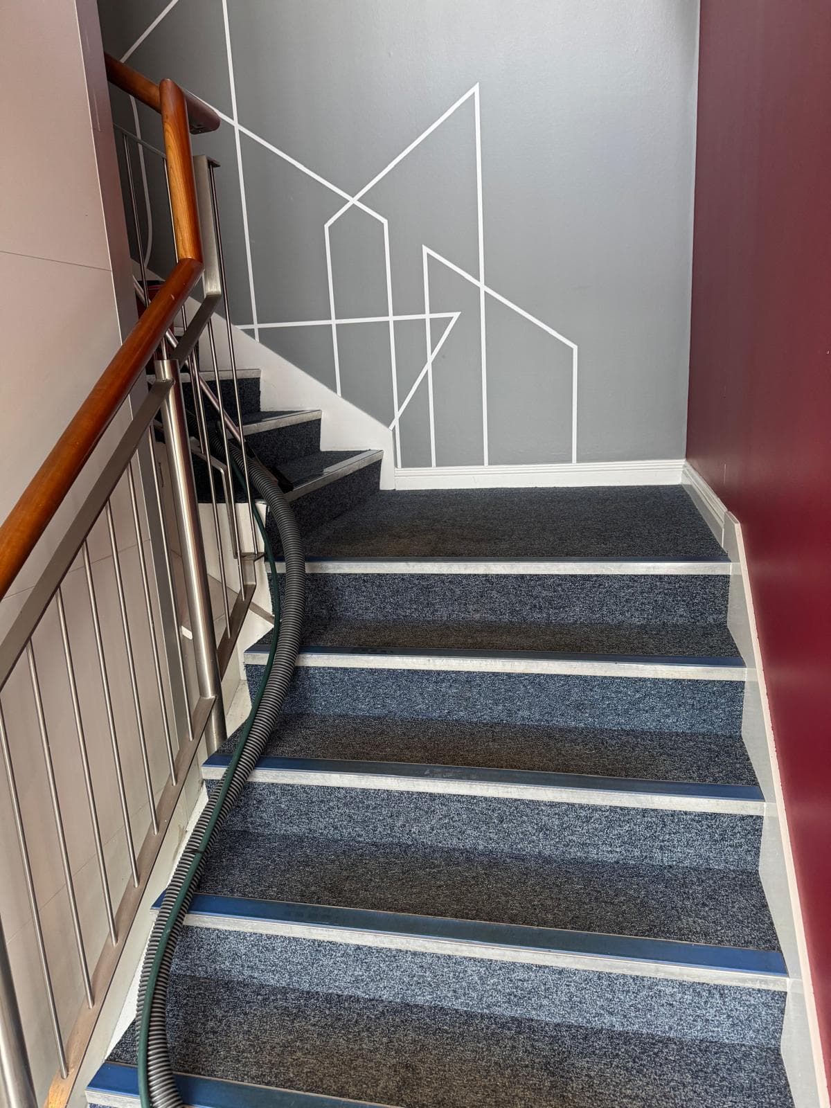 Communal stairwell carpet before shampoo