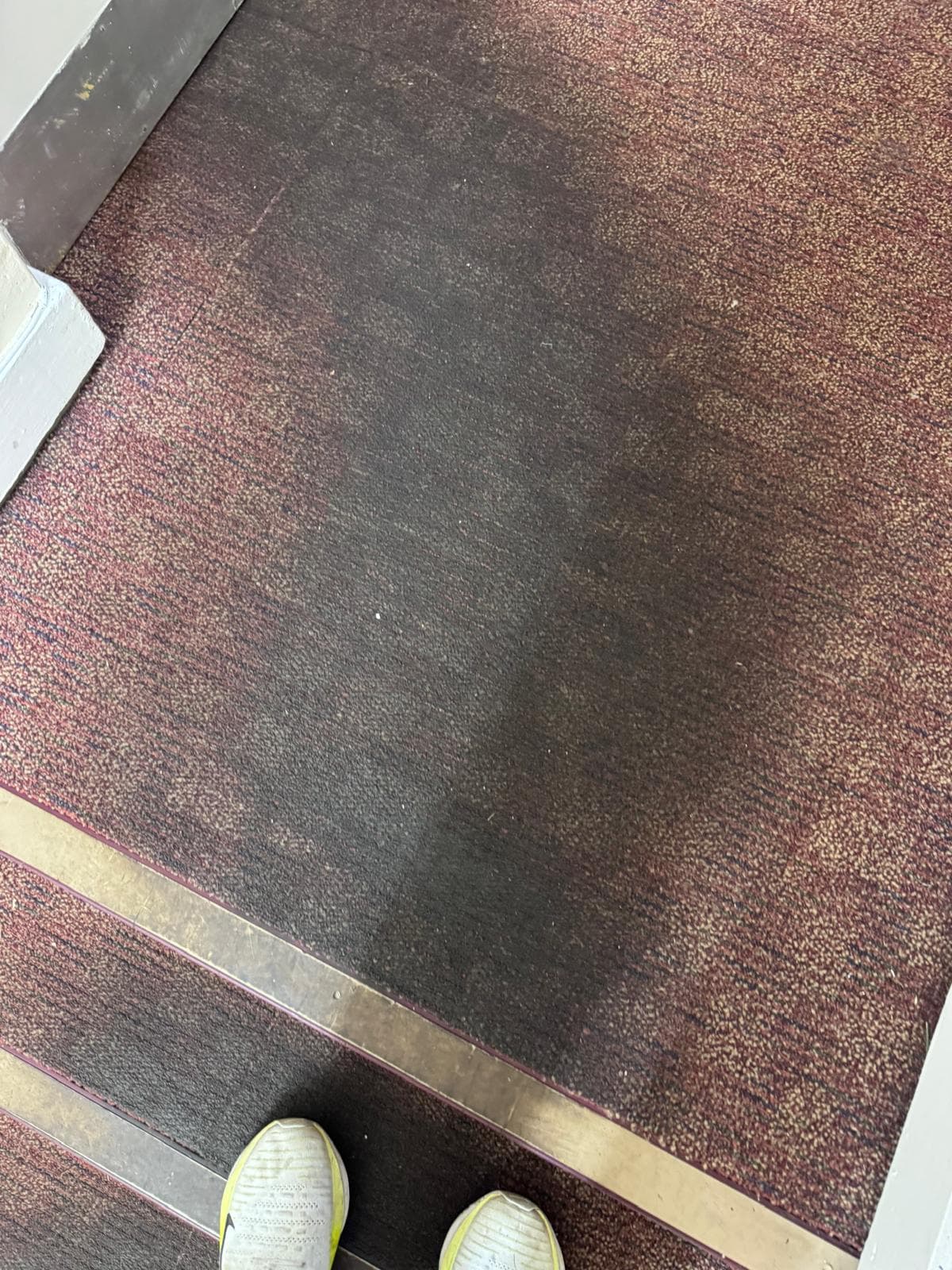 Grey office carpet with dark traffic lanes