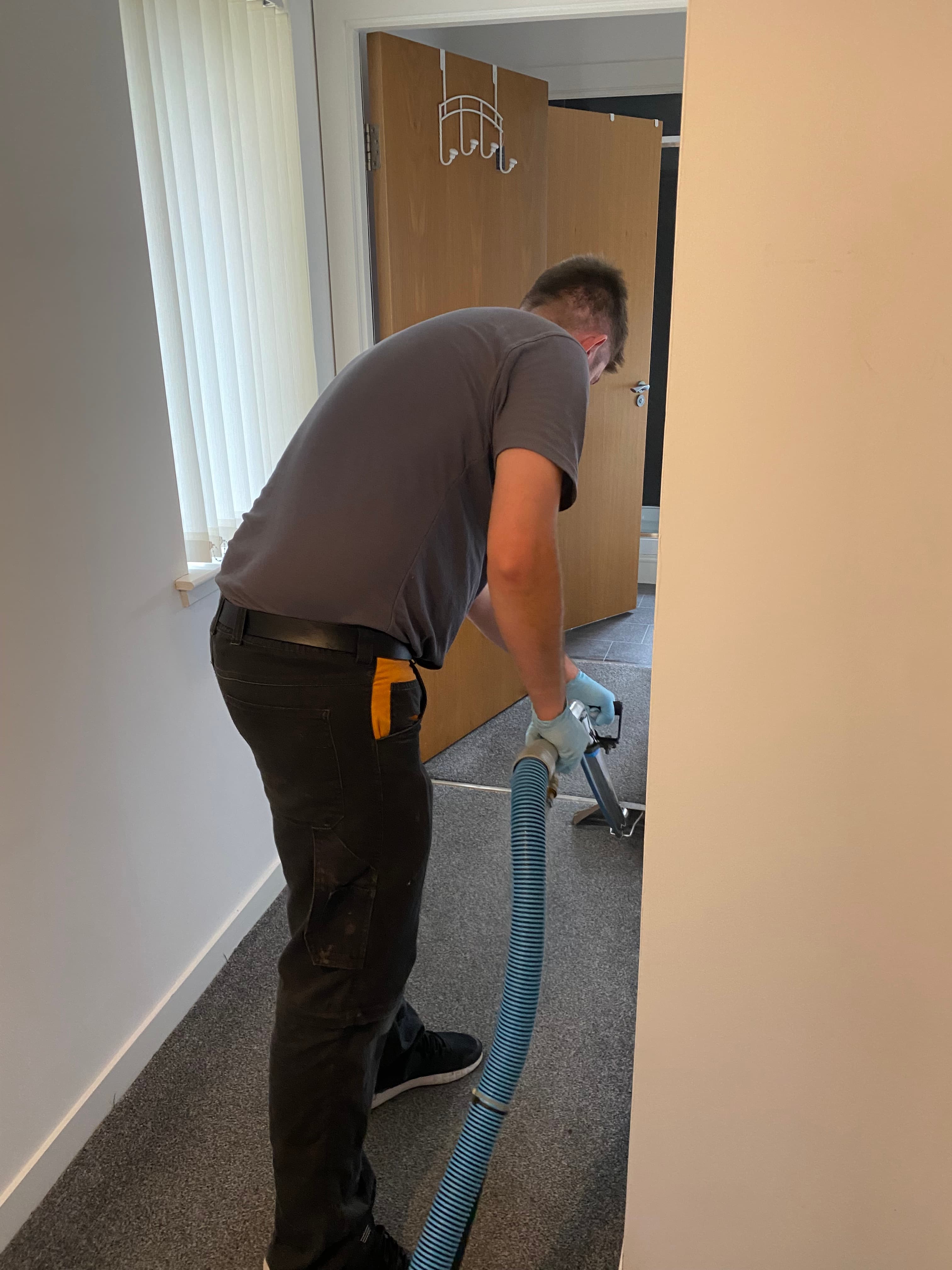 Deep carpet cleaning in progress