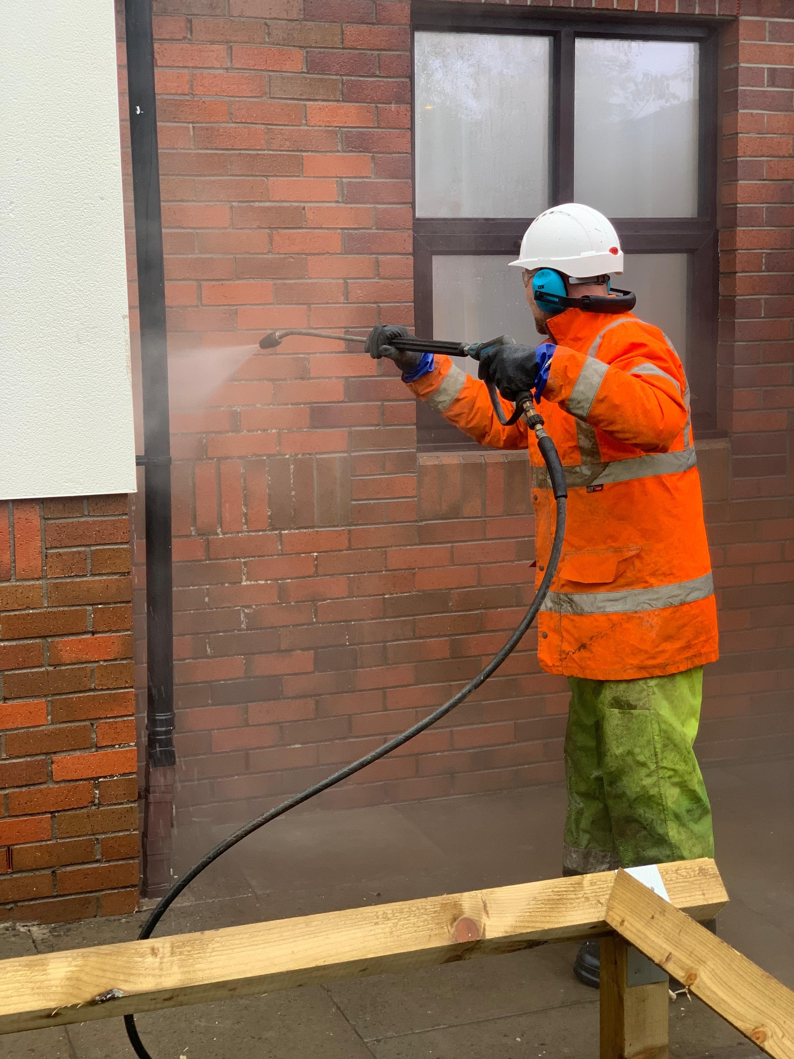Clean red brickwork after wash