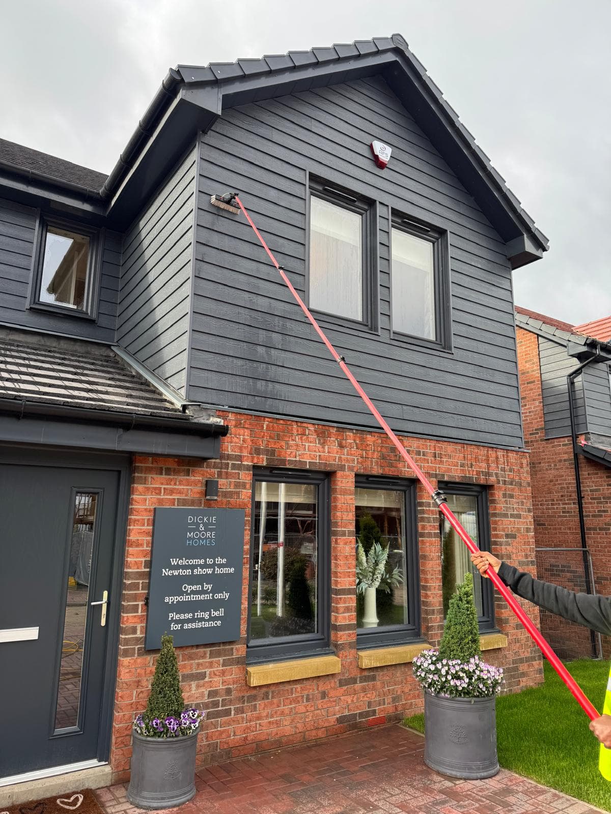 Dickie & Moore Newton show home signage