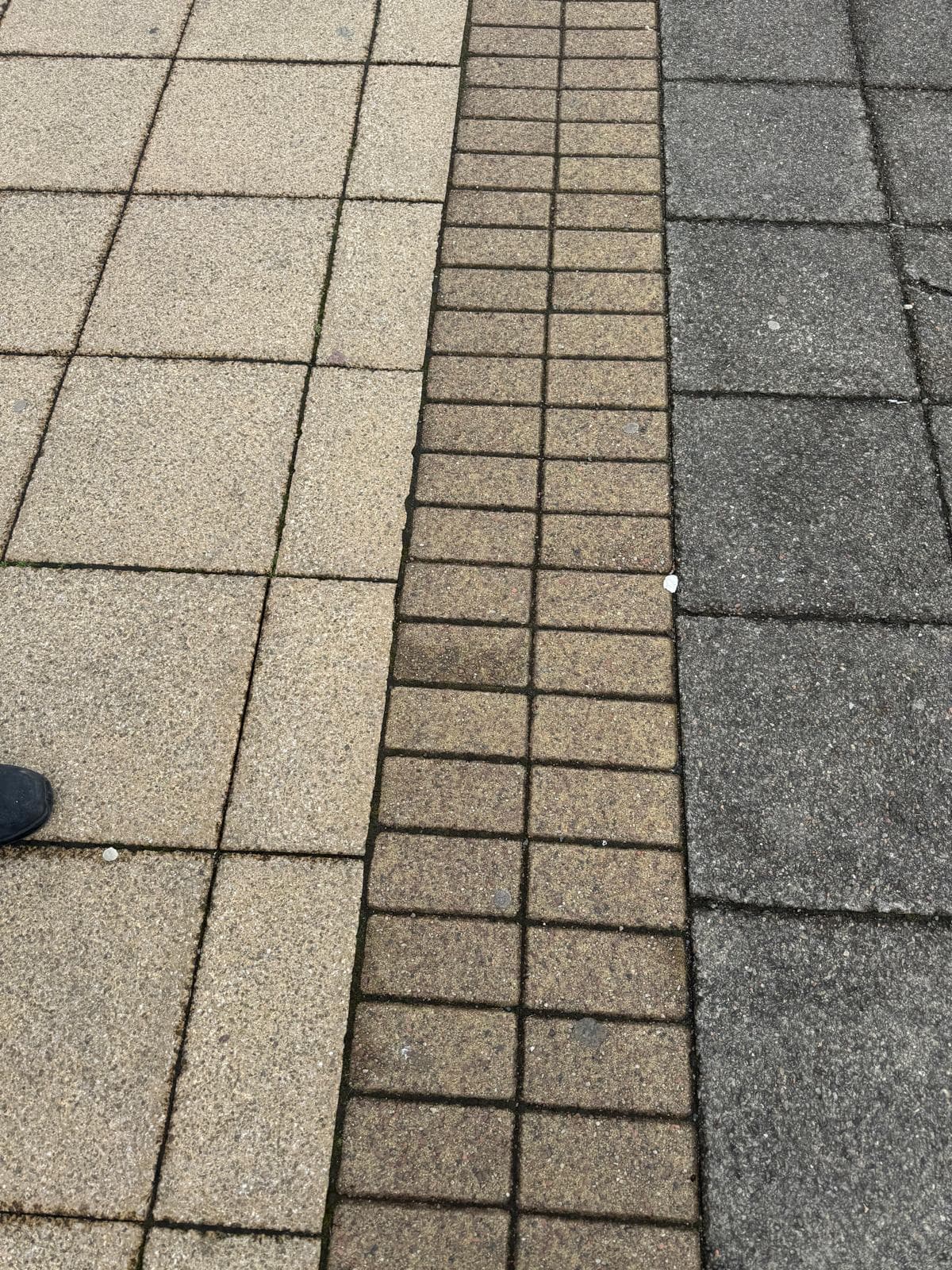PureGym entrance paving before jet wash