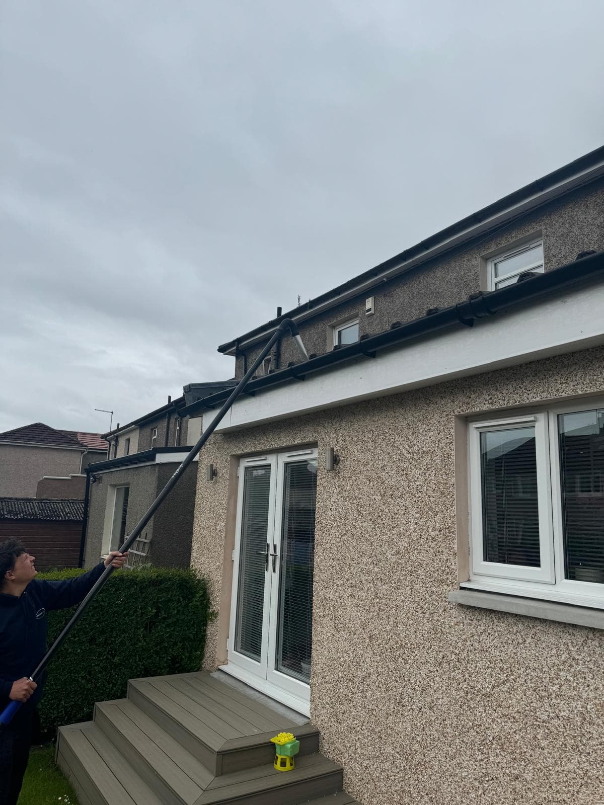 Renfrew gutter before clean – weeds in gutter