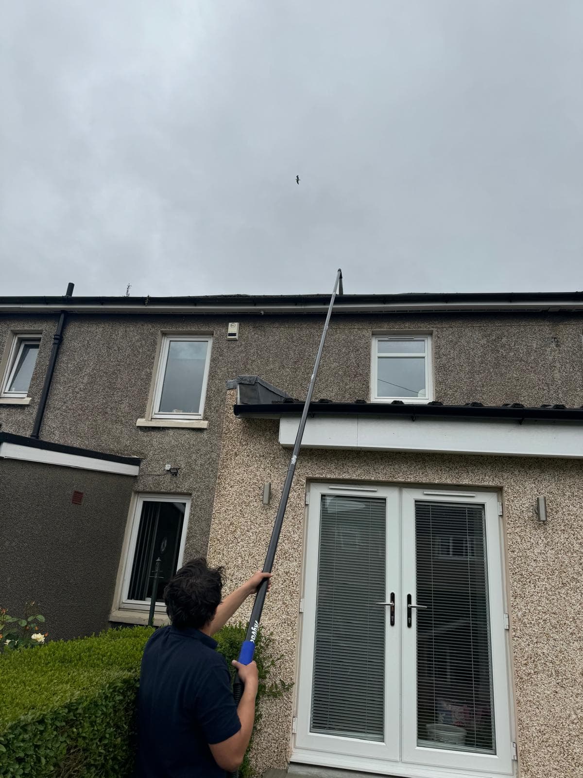 Ladder-free gutter clean on a residential semi