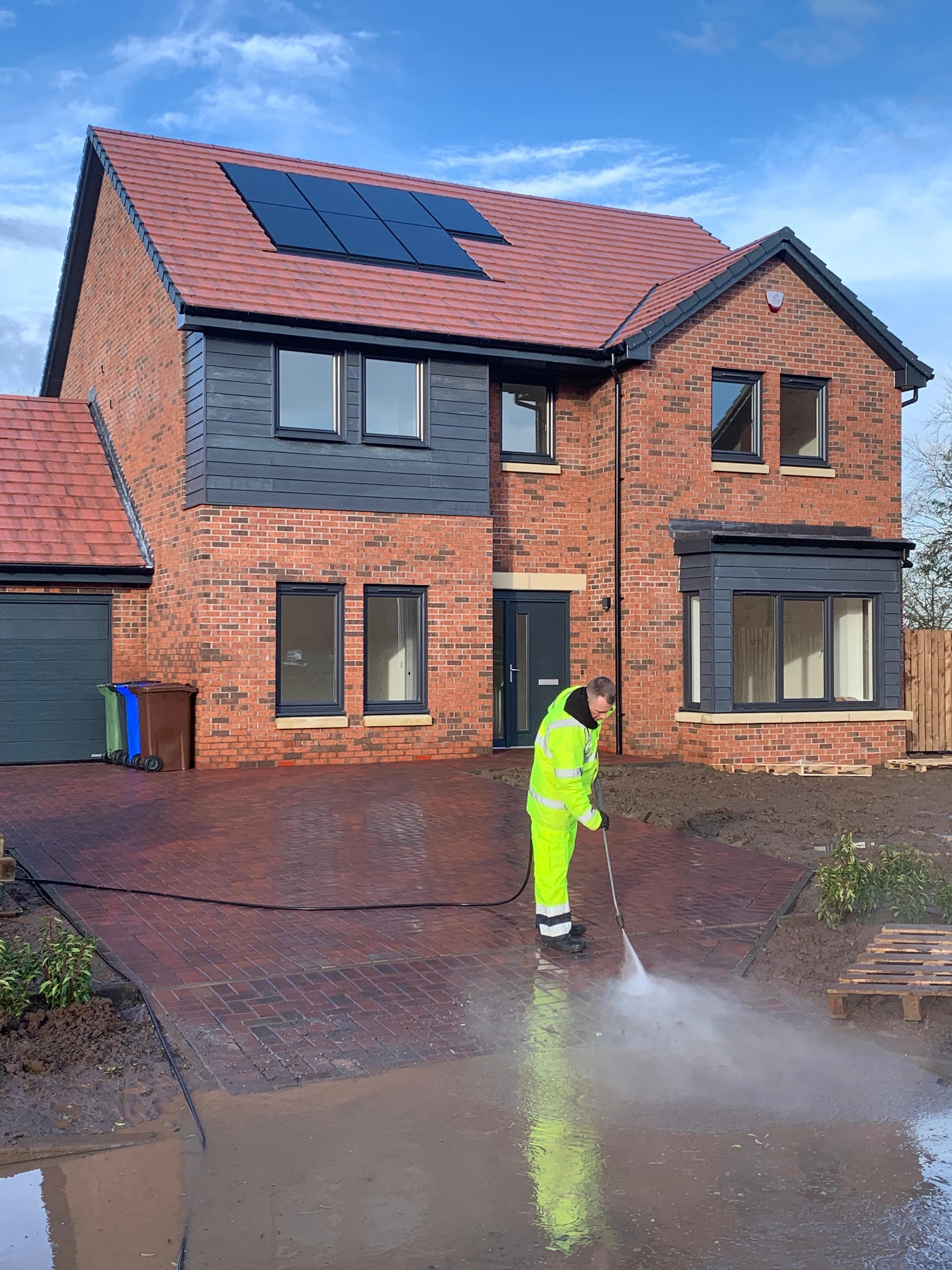 Block paving jet wash on Dickie & Moore plot