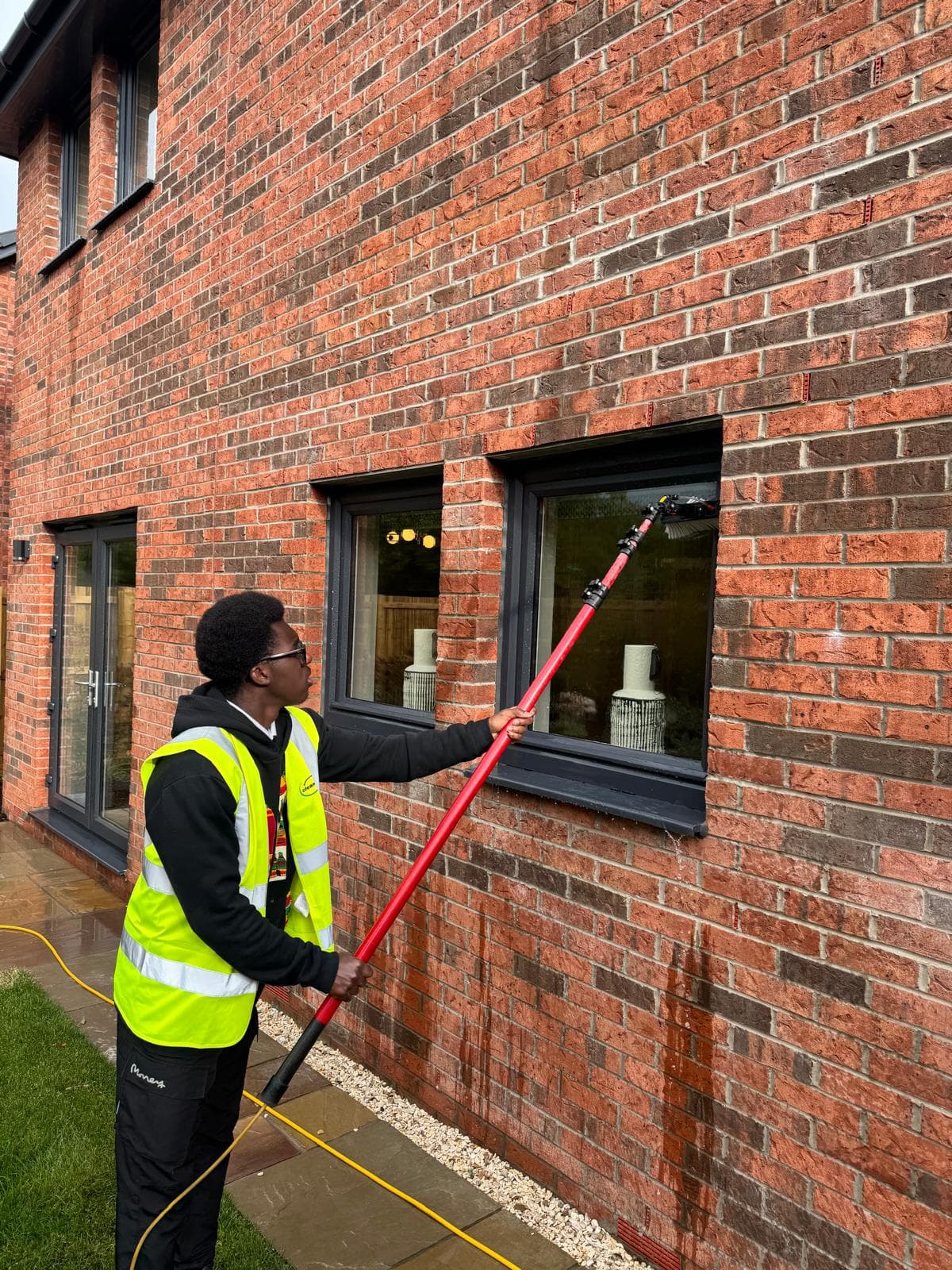 Water-fed pole window clean on a residential property